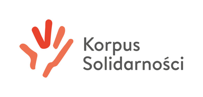 Logo: Z lewej strony schematyczny rysunek dłoni w kolorze czerwonym, z prawej strony tekst: Korpus Solidarności.